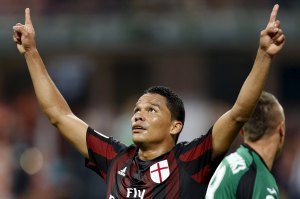 AC Milan's Bacca celebrates after scoring against Empoli during their Serie A soccer match in Milan